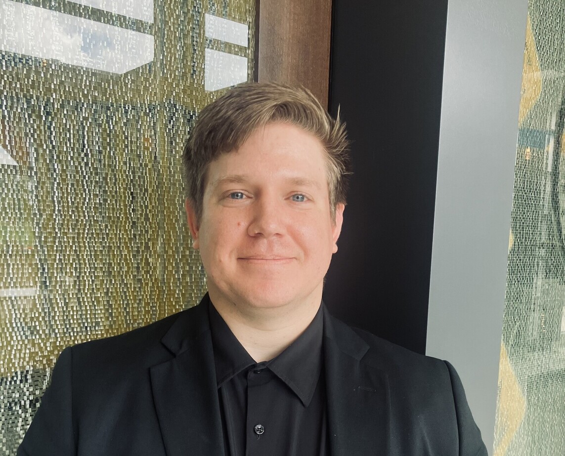 a man in a black suit a man in a black suit